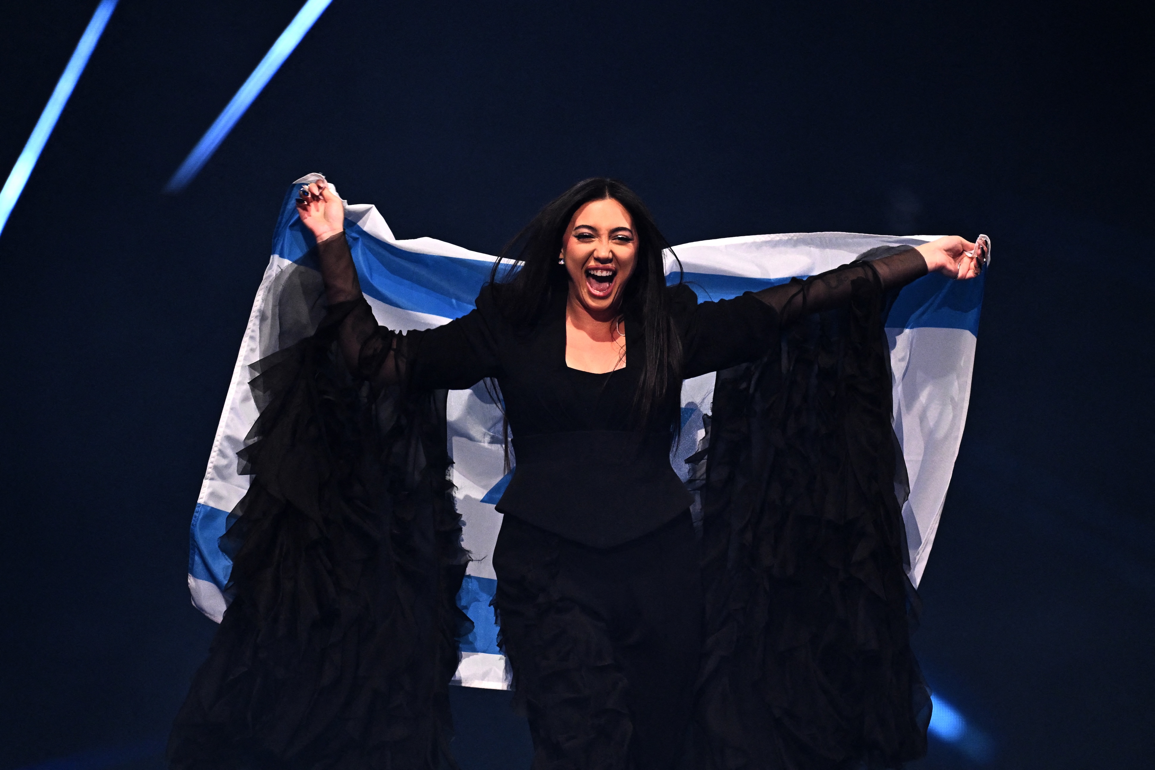 Israeli singer Yuval Raphael parades during the flag ceremony prior to the grand final of the Eurovision Song Contest 2025 in Basel, May 17, 2025. (AFP)