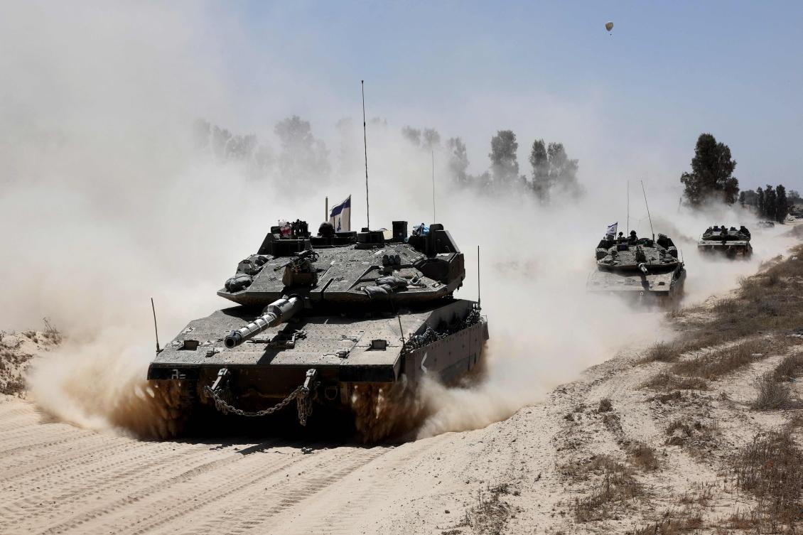 Israeli military vehicles deploy at Israel’s southern border with the Gaza Strip on May 20, 2025. (AFP)