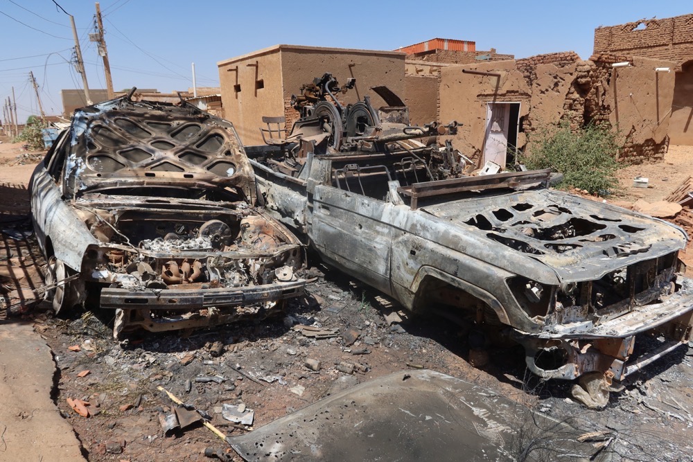 destroyed combat vehicles lying in khartoum’s sharg elnil area, which was recently liberated by the sudanese national army. (Reuters)