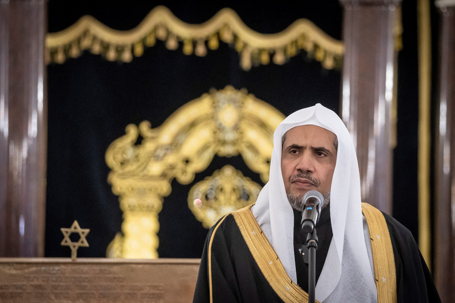 Secretary General of the Muslim World League Mohammad Abdulkarim al-Issa gives a speech during a visit to the Nozyk Synagogue on January 24, 2020 in Warsaw. (File/AFP)