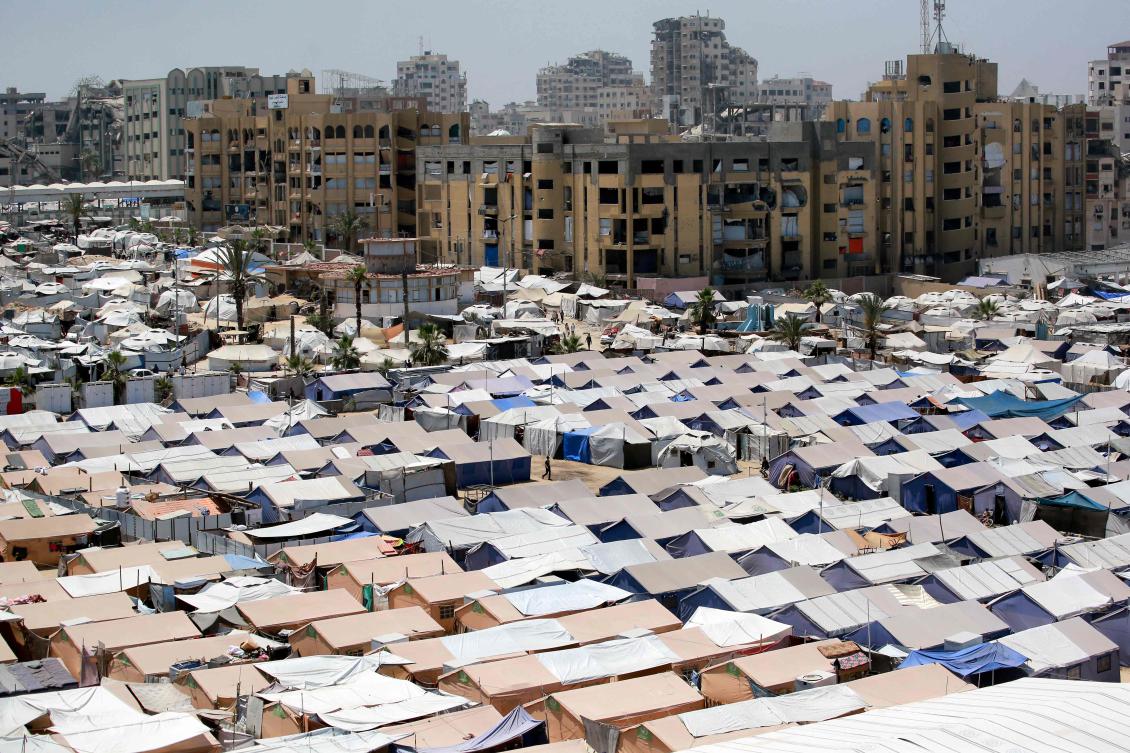Tents housing displaced Palestinians in Gaza City on Tuesday amid Israel's blockade of aid and increased military operation. (AFP)