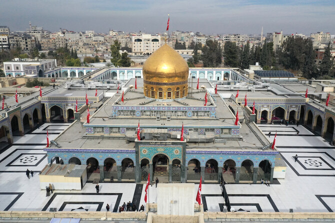 At the Sayyida Zeinab shrine, rituals of faith unfold: worshippers kneel in prayer, visitors raise their palms skyward or fervently murmur invocations as they press their faces against an ornate structure enclosing where they believe the granddaughter of Prophet Muhammad is entombed. (AFP/File)