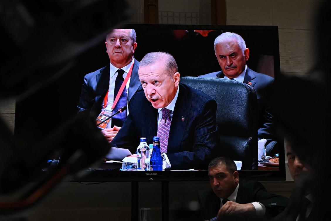 A screen at the press center shows Turkish President Recep Tayyip Erdogan during the informal summit of the Organization of Turkic States on May 21, 2025. (AFP)