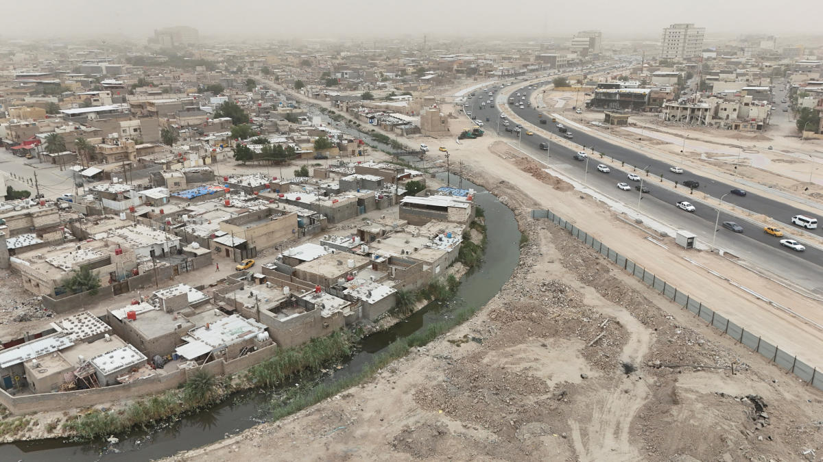 A drone view shows a polluted section of the al-Ashar River running through a residential neighborhood in Basra, Iraq, April 29, 2025. (REUTERS)