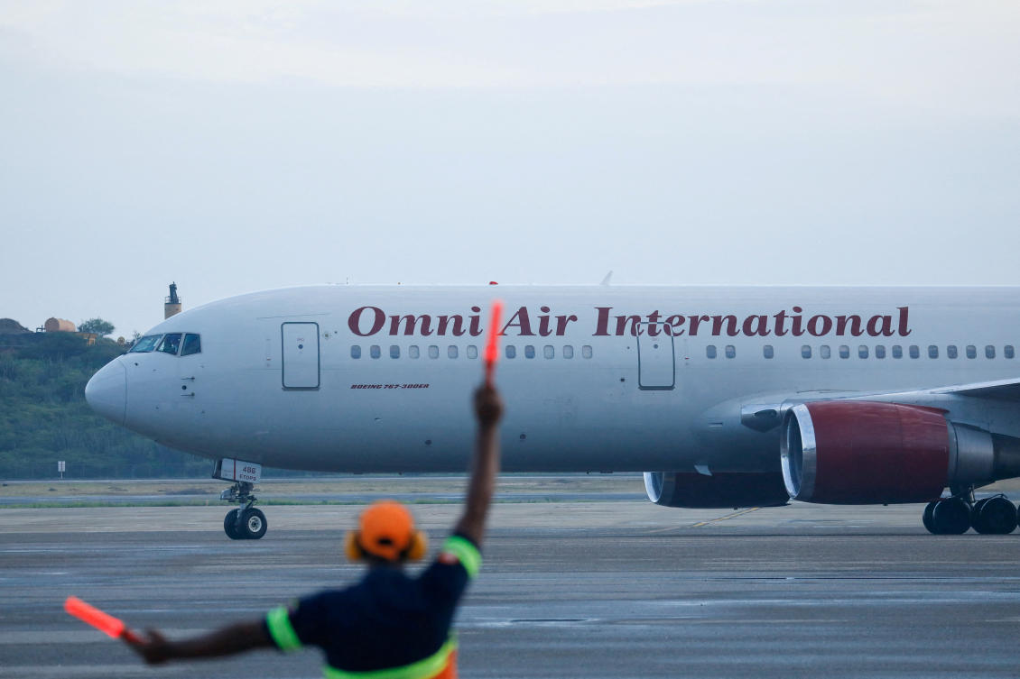 An Omni Air International plane carrying Venezuelan migrants arrives from the US on a deportation flight at Simon Bolivar International Airport, in Maiquetia, Venezuela May 9, 2025. (ReutersFile)
