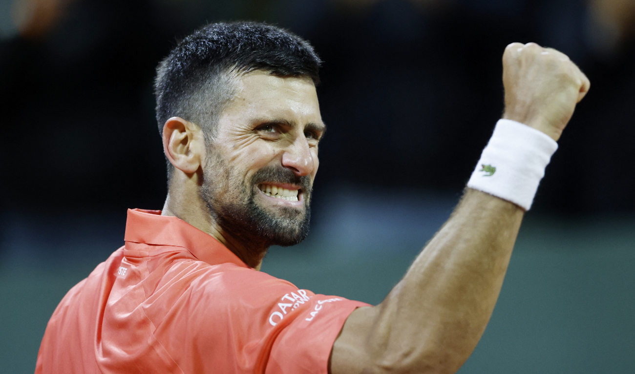 Serbia's Novak Djokovic celebrates after winning his quarter final match against Italy's Matteo Arnaldi. (Reuters)