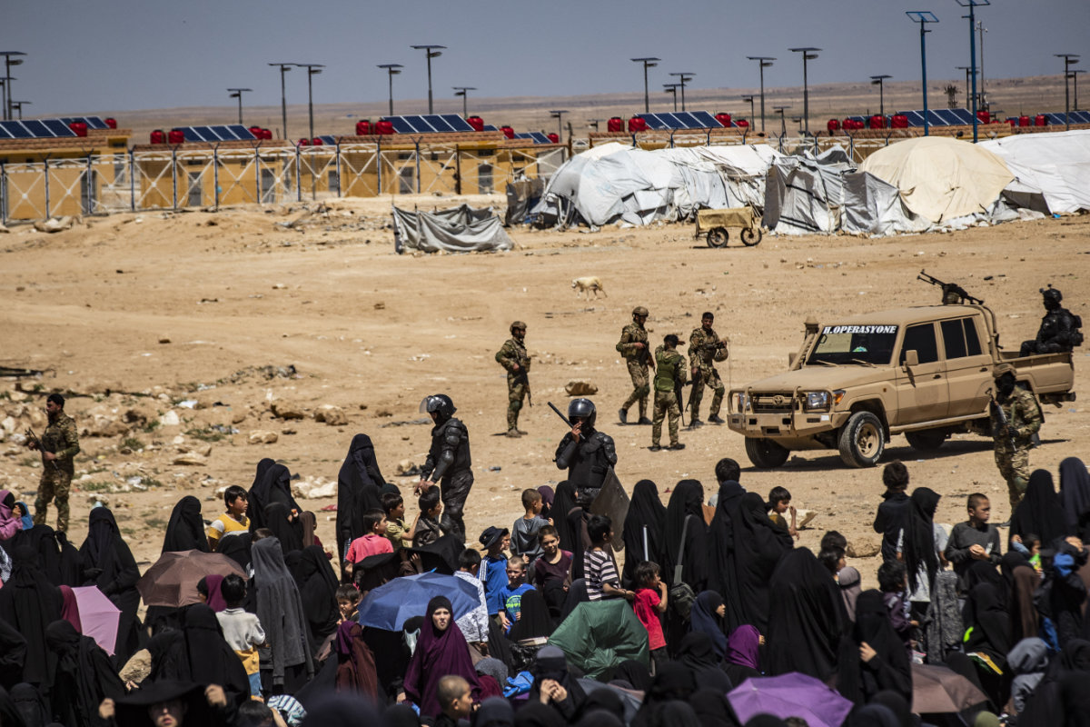 Members of the Syrian Kurdish Asayish security forces gather at the Kurdish-run Al-Hol camp, which holds relatives of suspected Daesh group fighters in the northeastern Hasakeh governorate, on April 18, 2025. (AFP)
