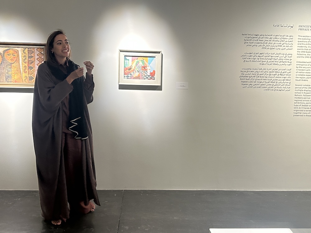 Guest curator Aisha Stoby during a media tour at the exhibition. (Supplied)