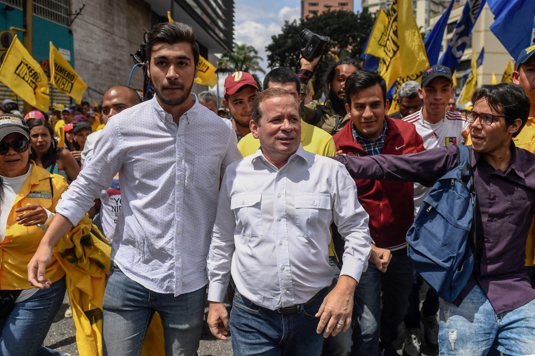Venezuelan opposition deputy Juan Pablo Guanine at a protest against lack of electricity, gas, water and gasoline in Caracas, Venezuela. (AFP)