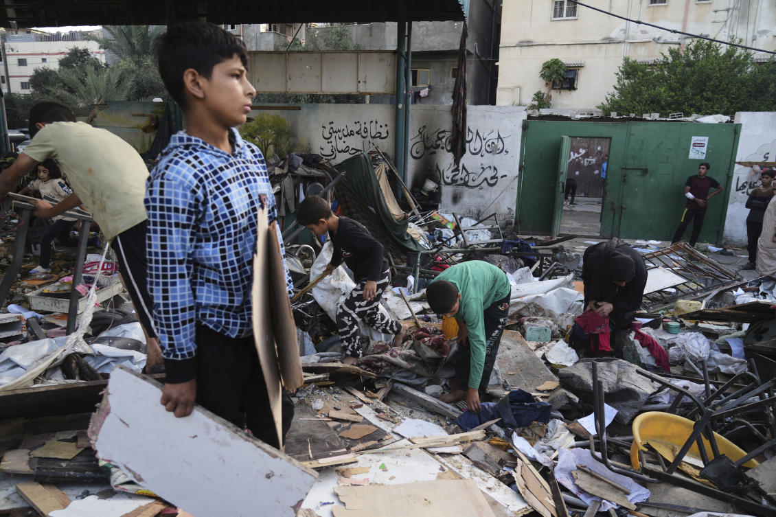 Palestinians inspect the damage at school used as a shelter by displaced residents that was hit by Israeli military strike and killed at least 36 people, in Gaza City, on Monday, May 26, 2025. (AP)