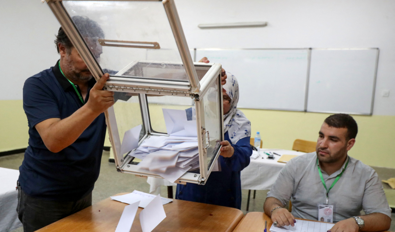 Election officials count the ballots at a polling station during the presidential election, in Algiers on September 7, 2024. (AFP/File)