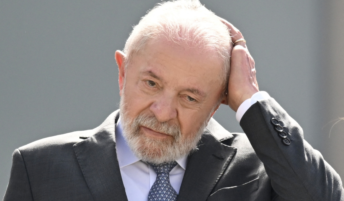 Brazil's President Luiz Inacio Lula da Silva gestures during a military parade welcoming Angola's President Joao Lourenco at Planalto Palace in Brasilia, on May 23, 2025. (AFP)