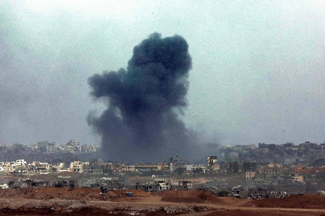 Destroyed buildings and billowing smoke as a result of Israeli bombardment in the besieged Palestinian territory. (AFP)