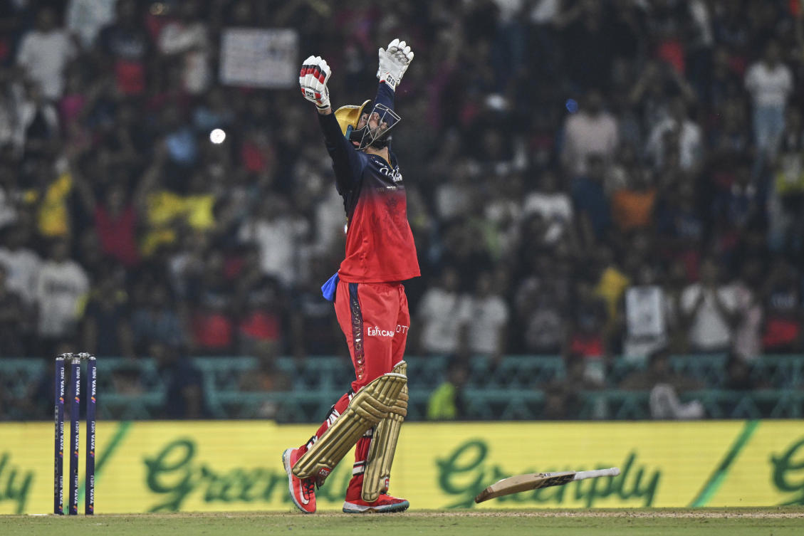 Bengaluru’s Jitesh Sharma celebrates after scoring the winning runs against Lucknow Super Giants at Atal Bihari Vajpayee Ekana Cricket Stadium in Lucknow, India, May 27, 2025. (AP Photo)
