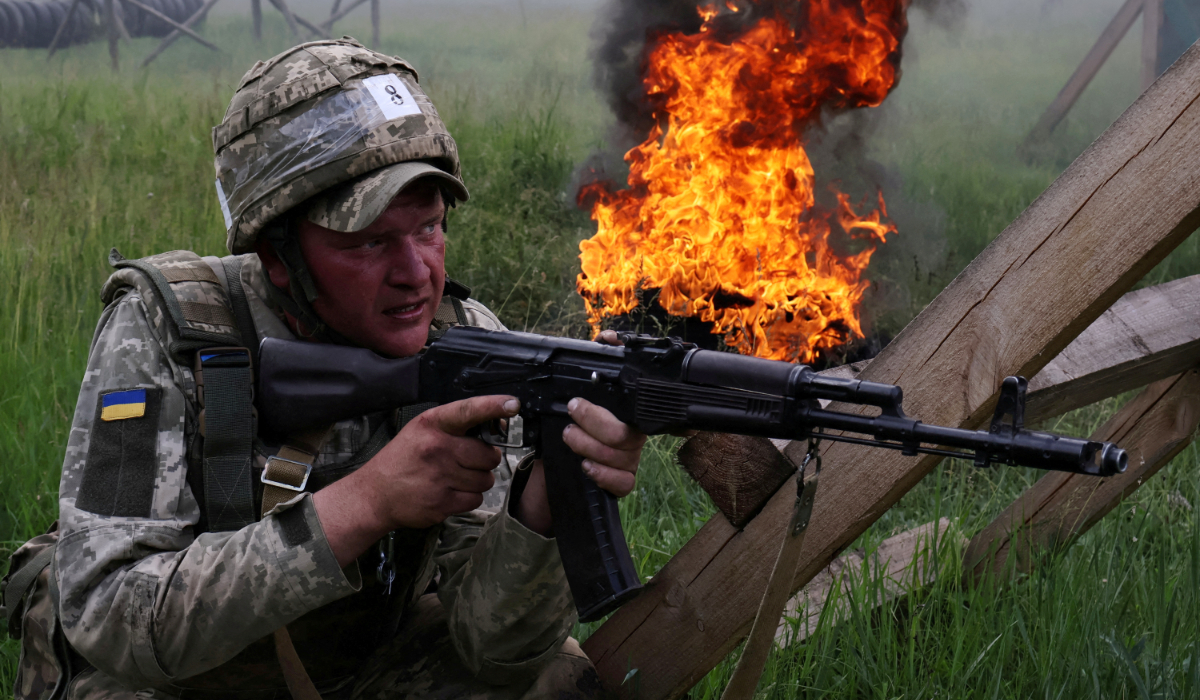 A serviceman of the 65th Separate Mechanized Brigade of the Ukrainian Armed Forces attends a military drill as a recruit near a frontline, amid Russia's attack on Ukraine, in Zaporizhzhia region, Ukraine, May 26, 2025. (REUTERS)