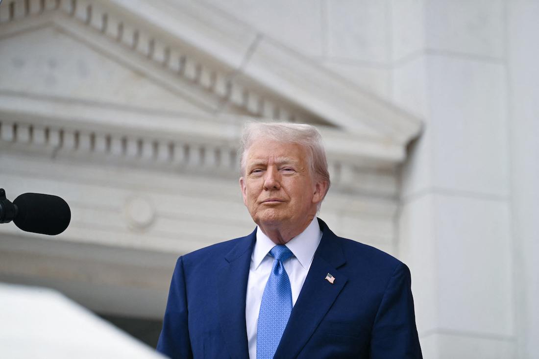 US President Donald Trump arrives to deliver remarks at the National Memorial Day Observance at the Memorial Amphitheatre in Arlington National Cemetery