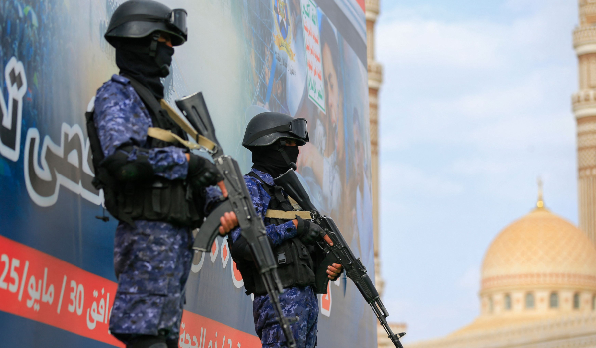 Members of security forces stand guard during a rally in solidarity with Palestinians in the Gaza Strip and in condemnation of US strikes, in Yemen's Huthi-run capital Sanaa on May 30, 2025. (AFP)