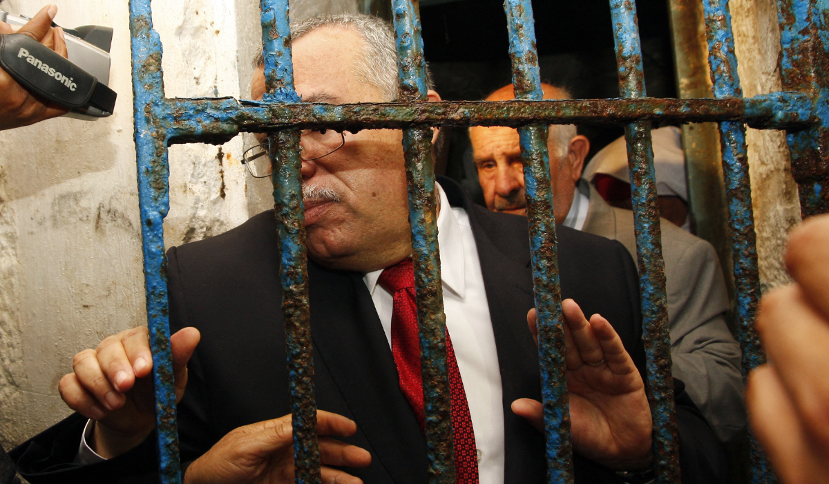 Tunisian Minister of Justice Noureddine Bhiri (C) visits the notorious prison of Ennadhour on April 29, 2012, in Bizerte. (AFP file photo)
