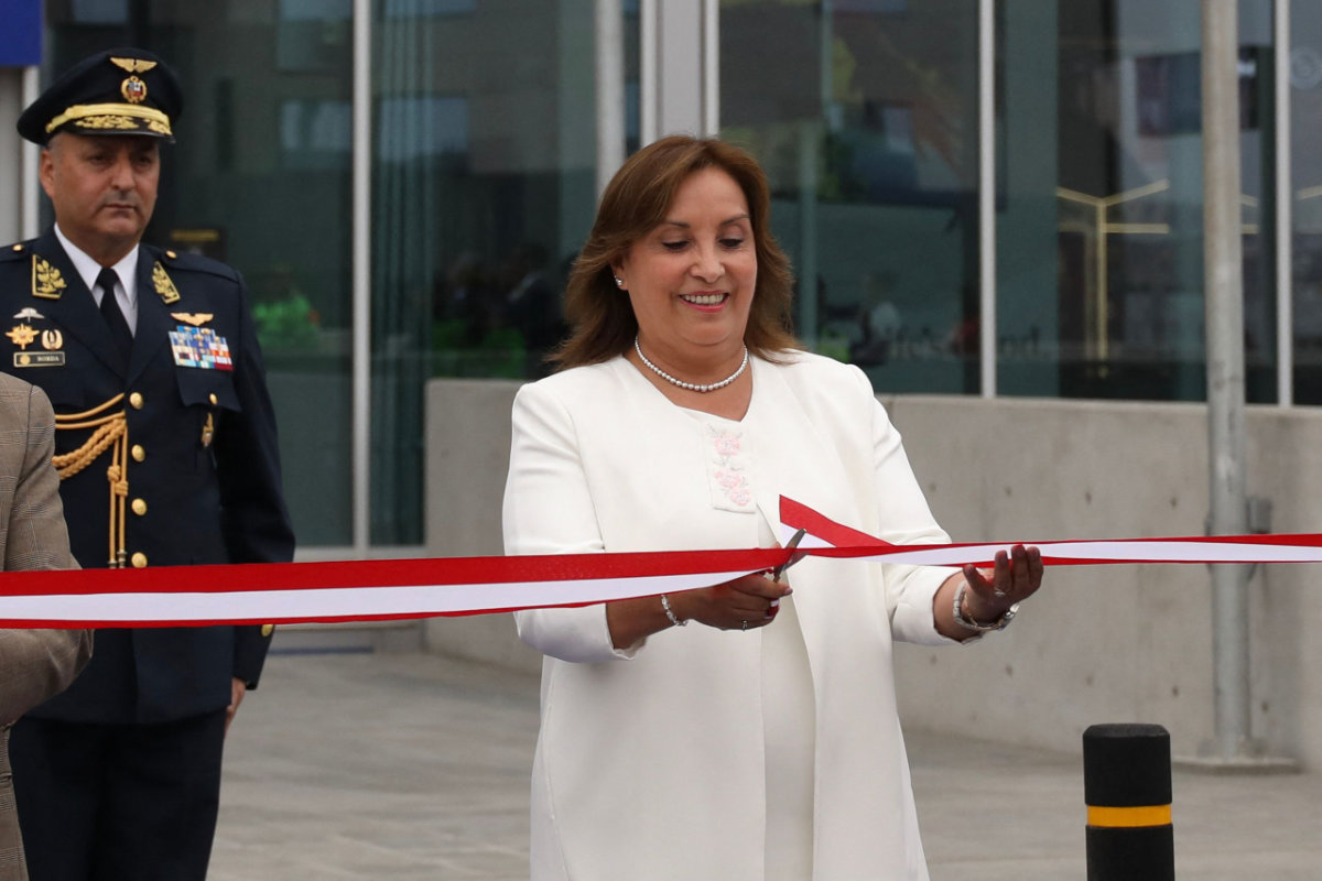 Peru's President Dina Boluarte cuts the ribbon during the official inauguration of the new Jorge Chavez International Airport, in Callao, Metropolitan Lima, on May 30, 2025. (AFP)