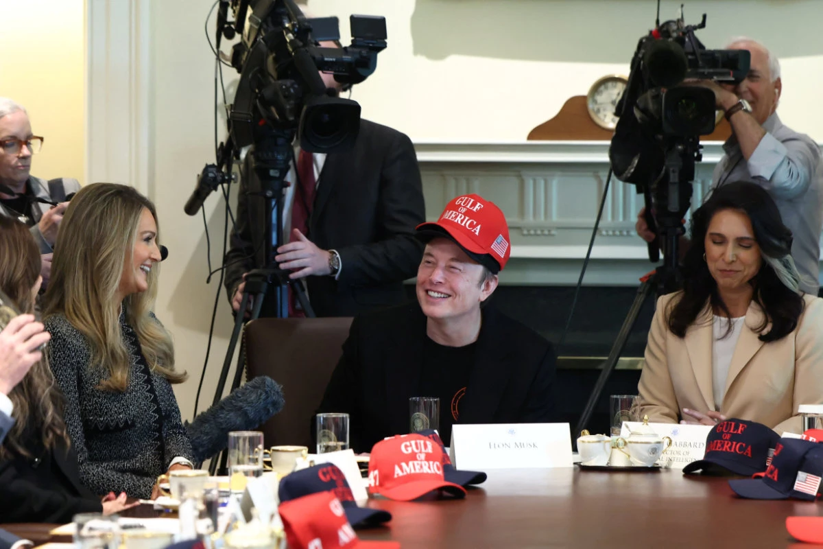 Tesla CEO Elon Musk reacts while wearing a cap with the words "Gulf of America" as he attends a cabinet meeting held by US President Donald Trump at the White House in Washington, on April 30, 2025. (REUTERS)