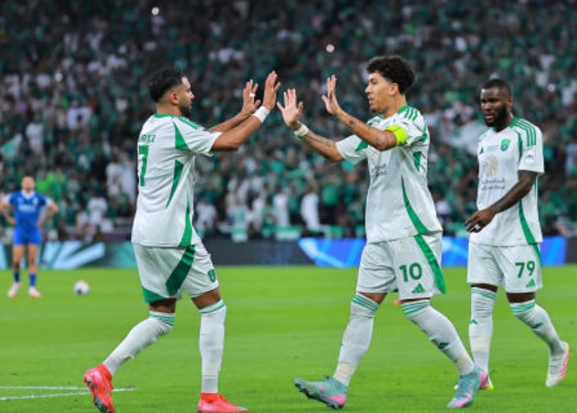 Al Ahli’s Roberto Firmino celebrates scoring their first goal with Riyad Mahrez during their Asian Champions League — Semi Final — against Al Hilal — King Abdullah Sports City, Jeddah — Apr. 29, 2025. (Reuters)