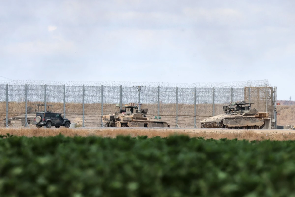Israeli armoured vehicles take position on Israel's border with the Gaza Srip on May 4, 2025. (File/AFP)