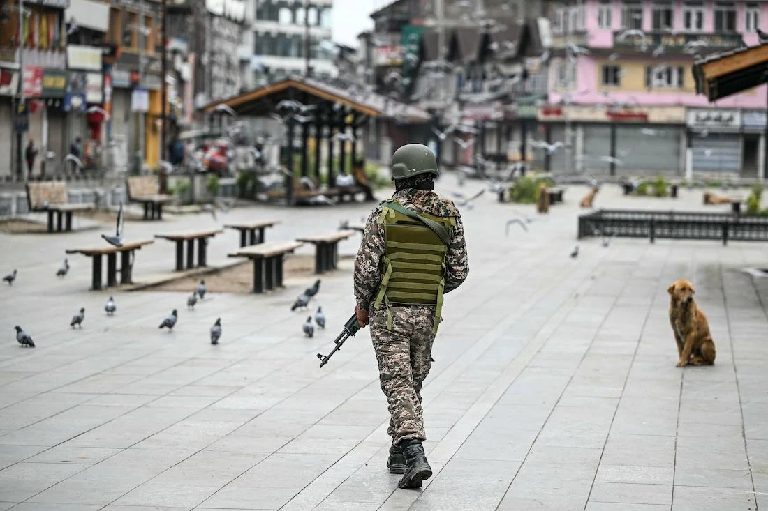 An Indian paramilitary soldier patrols at a marketplace in Srinagar on May 10, 2025. (File/AFP)