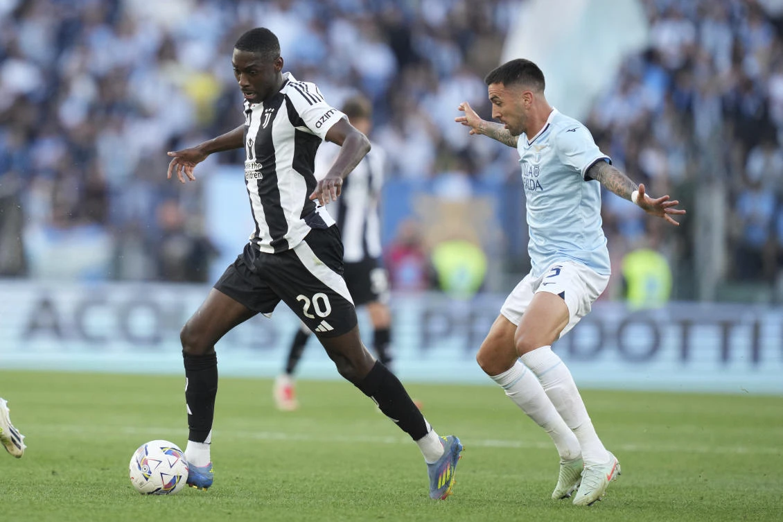 Juventus’ Randal Kolo Muani and Lazio’s Matias Vecino in action during their Serie A match at Rome’s Olympic stadium, May 10, 2025. (AP)