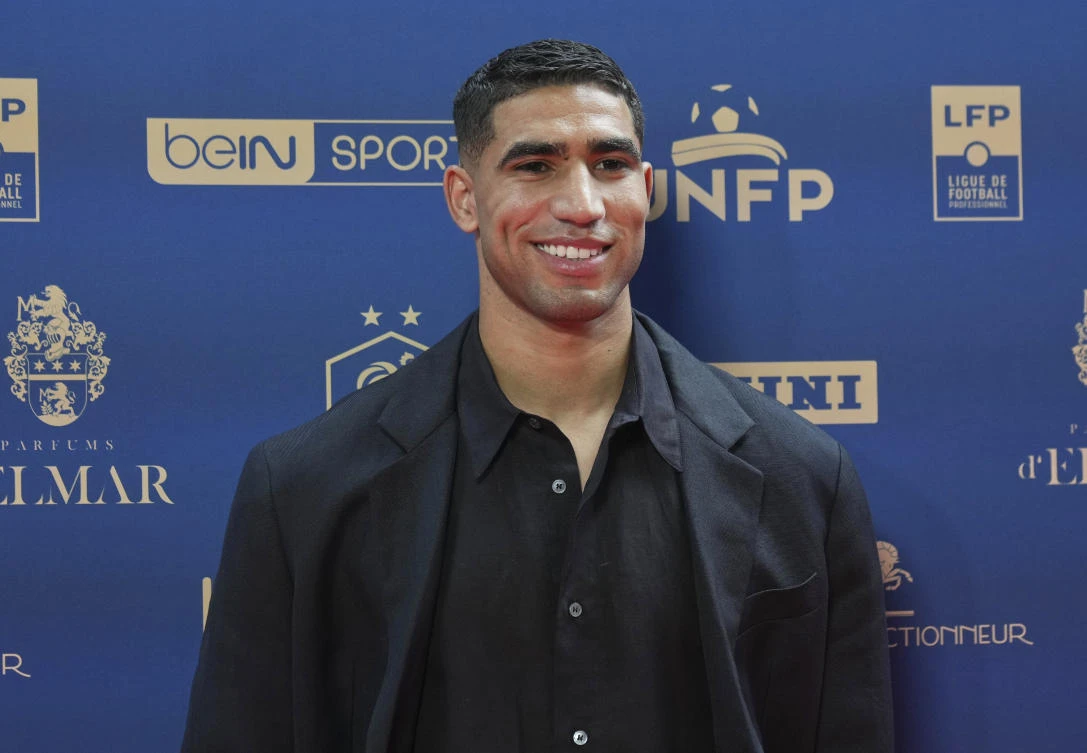 Paris Saint Germain's Achraf Hakimi arrives at the UNFP (French player's union) Trophies ceremony in Paris, France, Sunday, May 11, 2025. (AP)