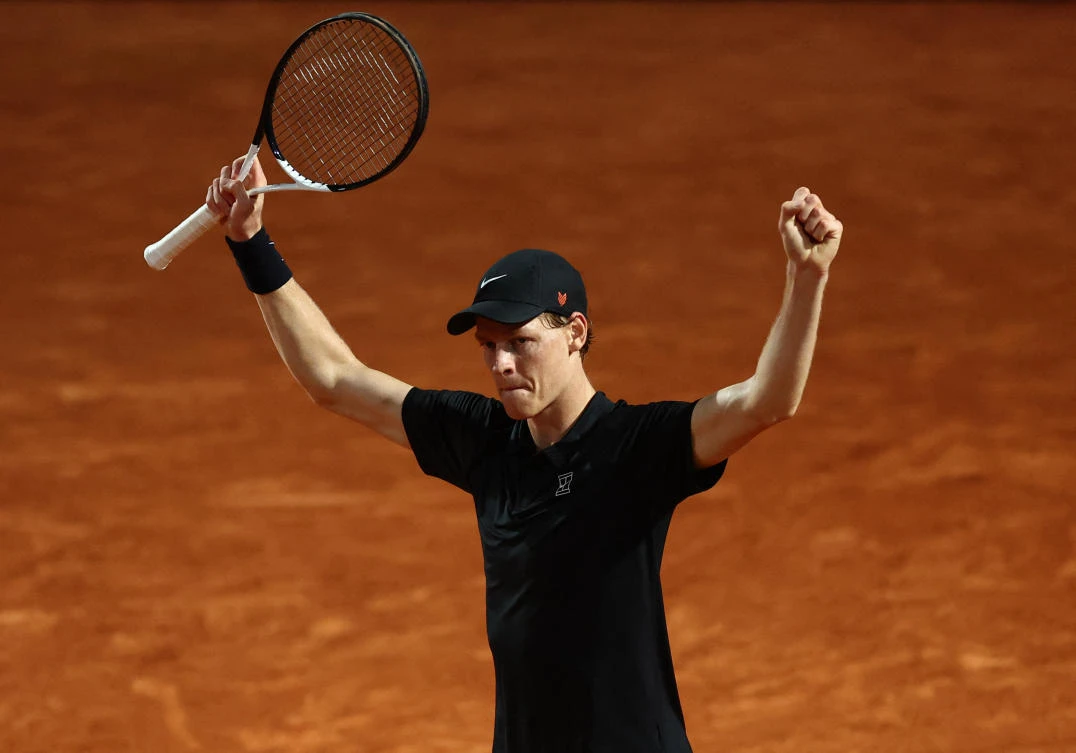 Italy’s Jannik Sinner celebrates winning his round of 16 match against Argentina’s Francisco Cerundolo at the Italian Open — Foro Italico, Rome, May 13, 2025. (Reuters)