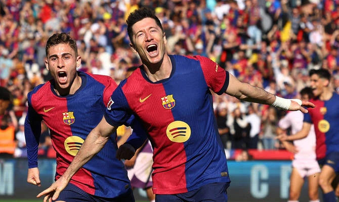 Barcelona striker Robert Lewandowski is set to return to action in Thursday's LaLiga clash at Espanyol, manager Hansi Flick said, as his side prepare to wrap up the title this week. (Reuters/File)