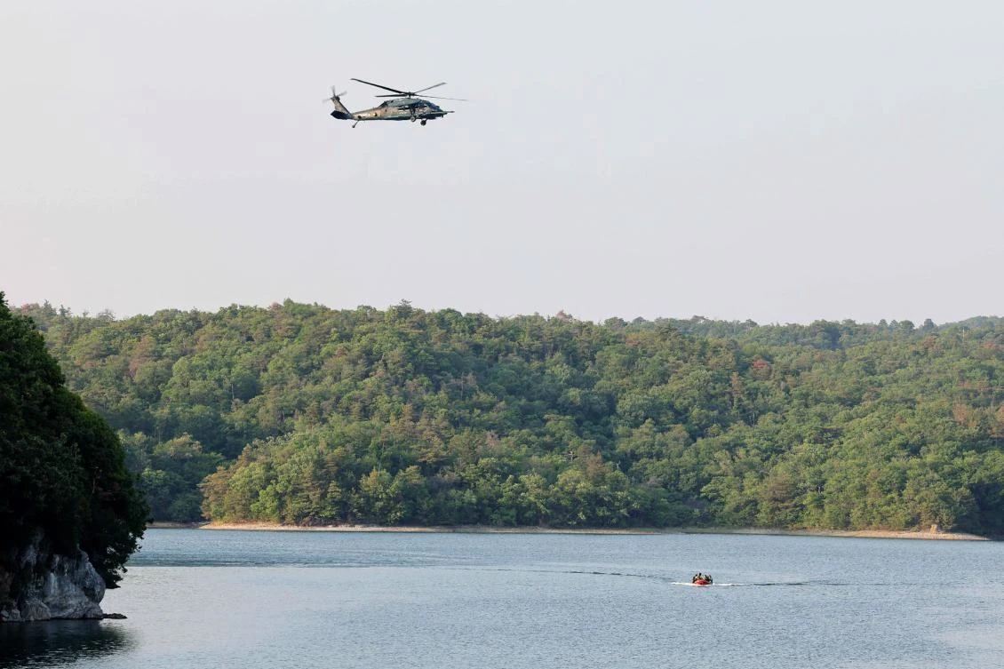 This picture shows Lake Iruka, where a Japan Air Self-Defense Force training plane T-4 crashed, in Inuyama City, Aichi Prefecture, May 14, 2025. (AFP)