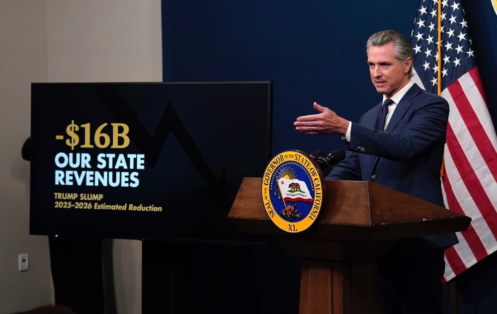 Newsom told a press conference that California should freeze admission to the public Medi-Cal program for undocumented people starting next year. (AP)
