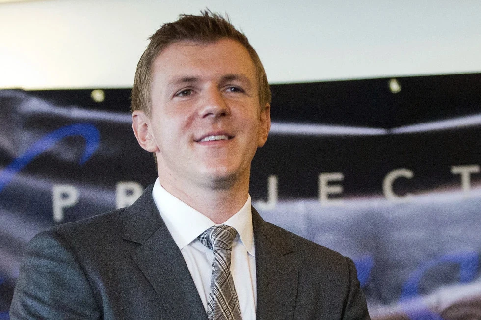 James O’Keefe, founder of a conservative nonprofit, waits to be introduced during a news conference, Sept. 1, 2015, in Washington. (AP Photo/File)