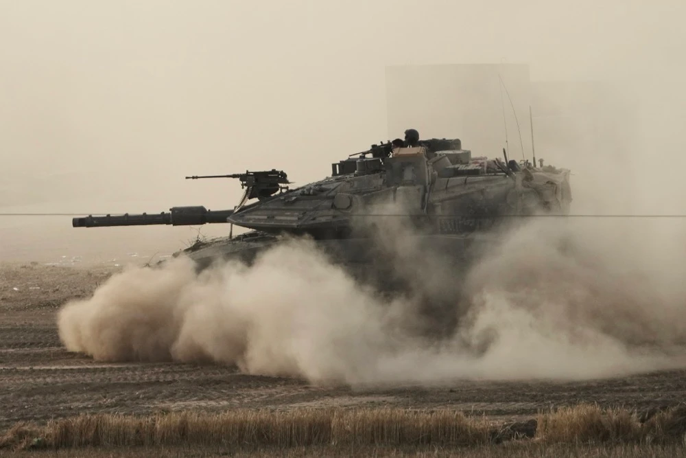 An Israeli tank moves in a staging area in southern Israel, near the border with Gaza, Friday, May 16, 2025. (AP)