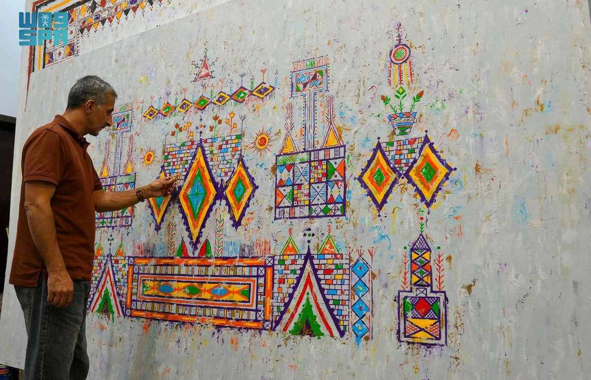 For more than three decades, Saudi visual artist Ibrahim Al-Almaai has devoted his time to documenting Al-Qatt Al-Asiri, a vibrant, centuries-old art form traditionally painted by women on the walls of homes across the Asir region. (SPA)