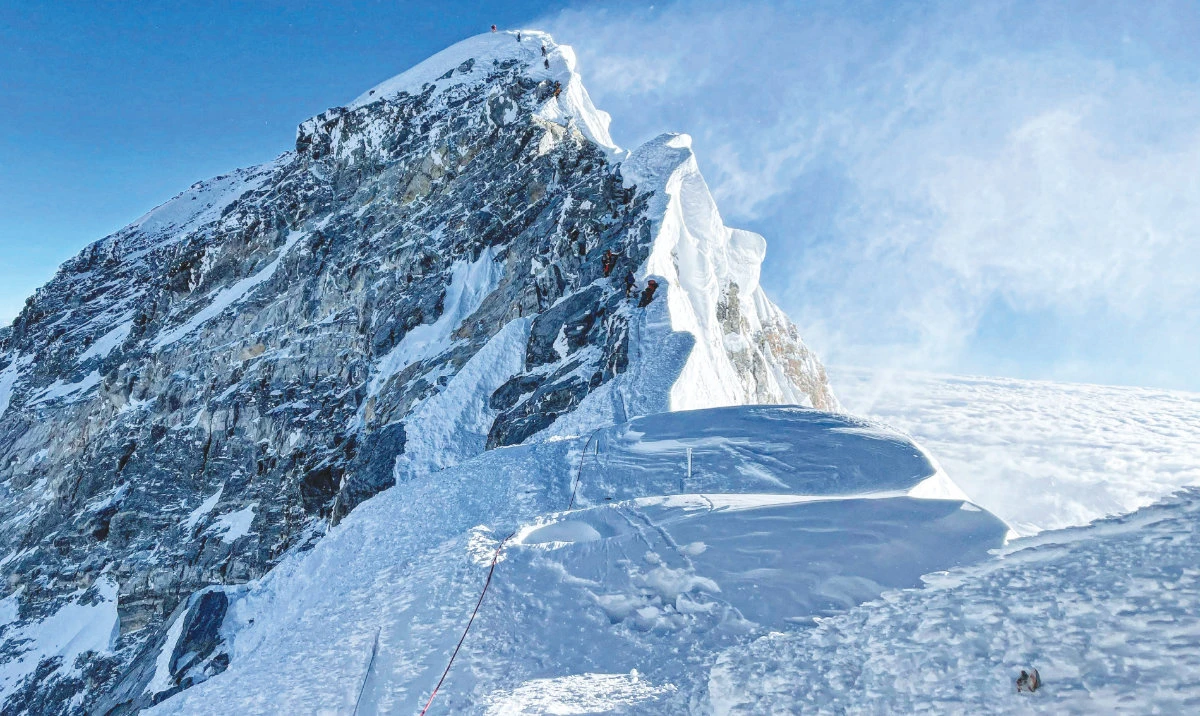 British climber Kenton Cool first climbed Mount Everest in 2004 and has since had an expedition almost every year. (AFP)