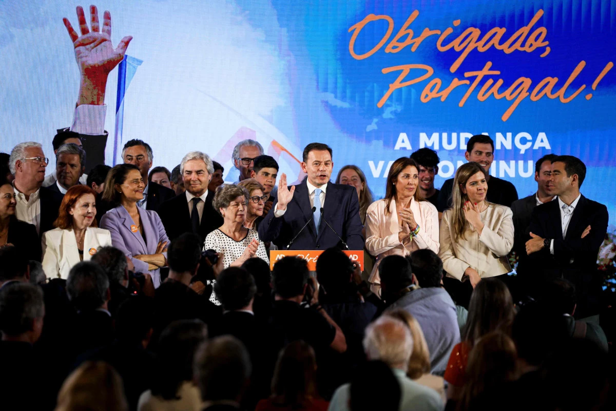Democratic Alliance party leader and Portuguese Prime Minister Luis Montenegro (C) celebrates his victory during the election night in Lisbon early on May 19, 2025. (AFP)