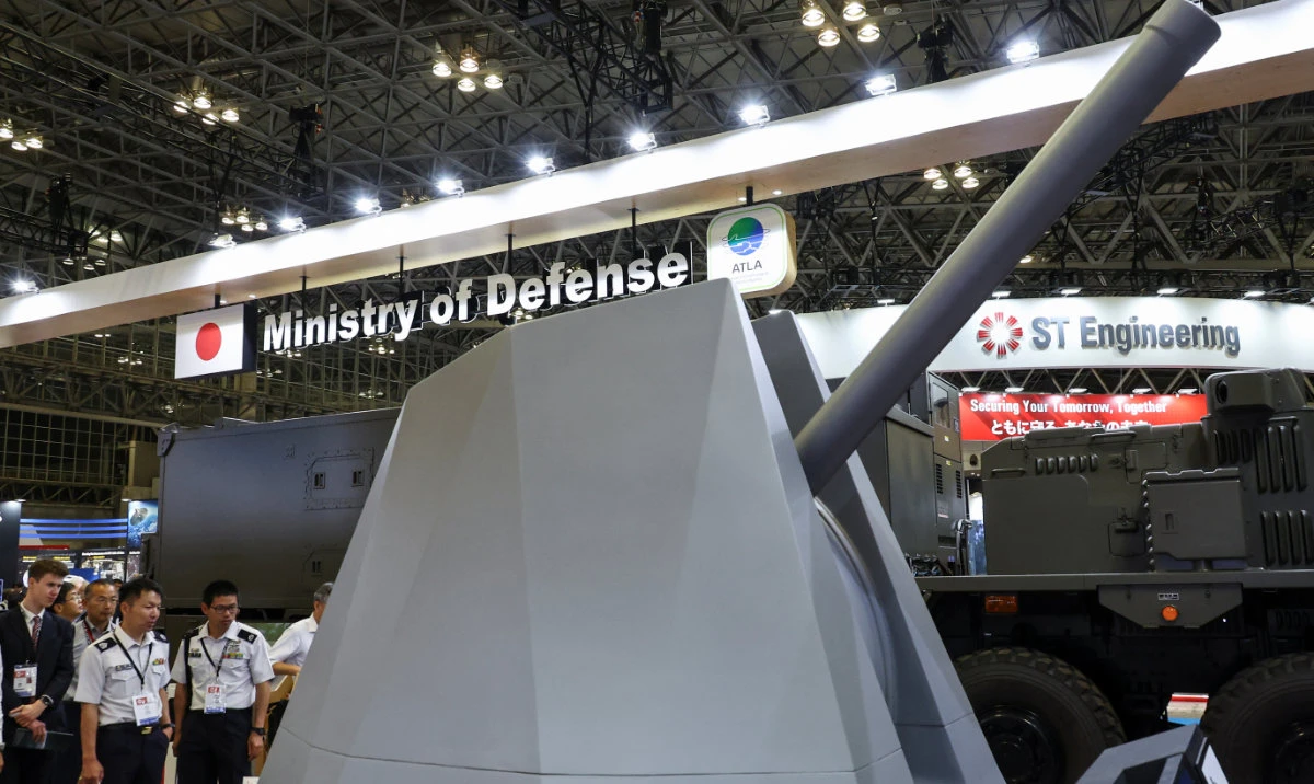 Japan flexes defense ambitions at arms show
