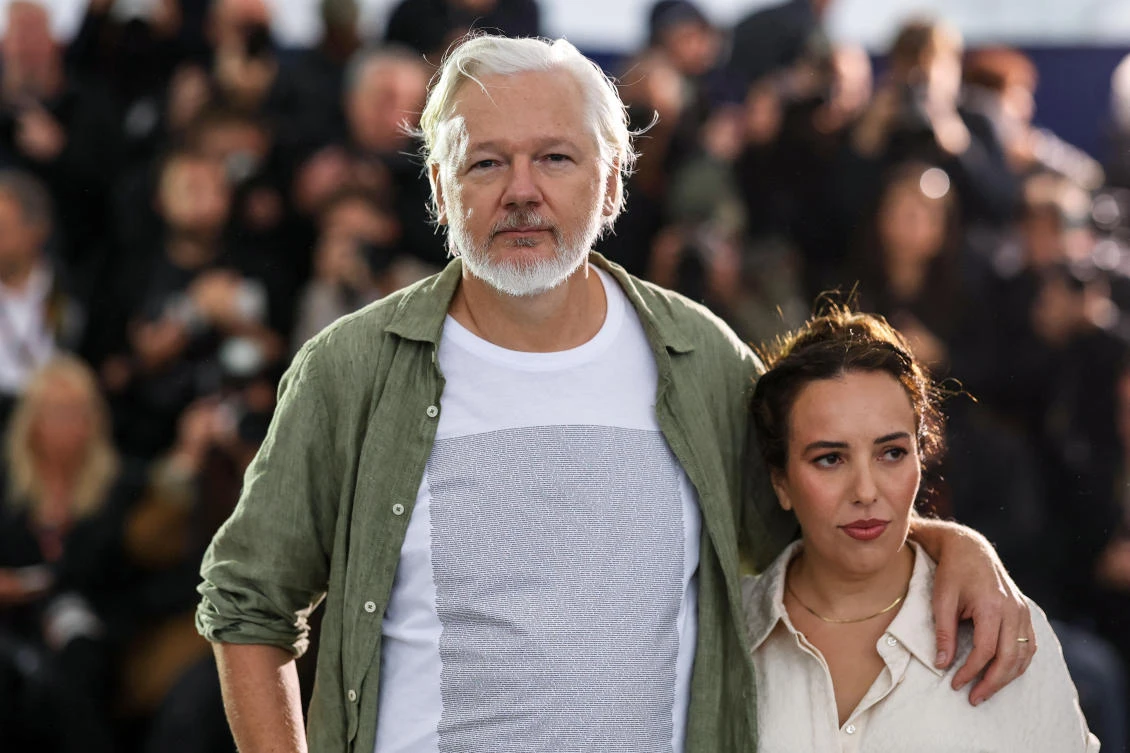 WikiLeaks founder Julian Assange and Stella Assange pose during a photocall for the documentary film The Six Billion Dollar Man presented as part of Special Screenings at the 78th Cannes Film Festival in Cannes, France, May 20, 2025. (Reuters)