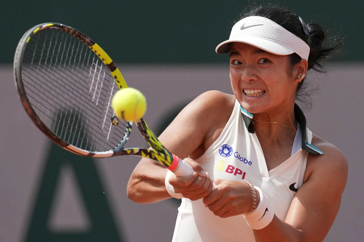 Philippines’ Alexandra Eala returns the ball to Colombia’s Emiliana Arango during their first round match of the French Open at the Roland Garros stadium in Paris Sunday. (AP)