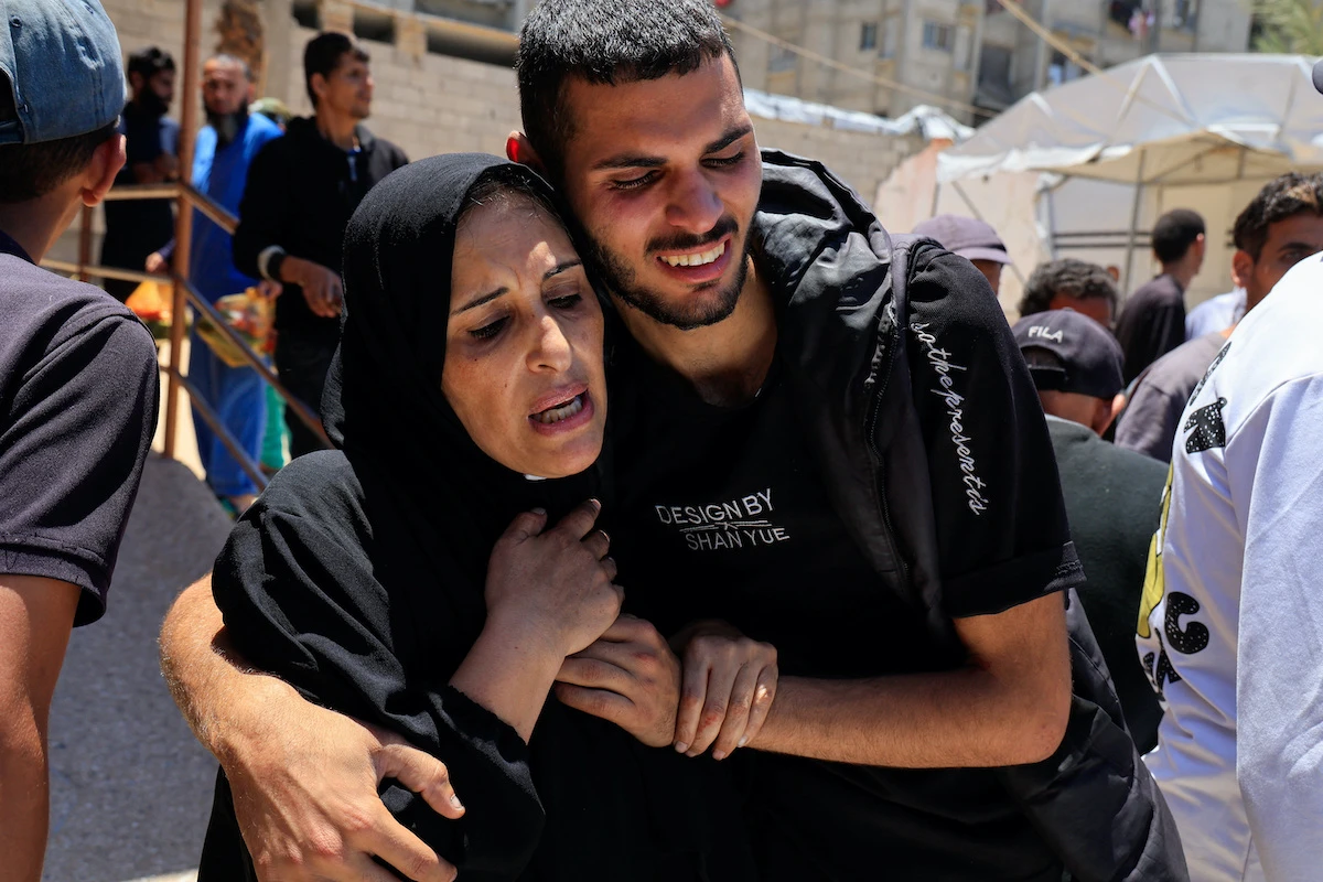 Mourners attend the funeral of Palestinians killed in Israeli strikes, in Khan Younis, in the southern Gaza Strip on Wednesday. (Reuters)