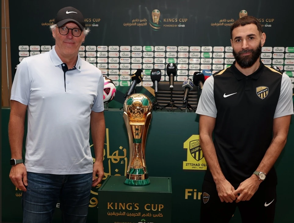 Al-Ittihad head coach Laurent Blanc and captain Karim Benzema in front of the King Cup trophy ahead of Friday’s final match against Al-Qadsiah at Al-Inma Stadium in Jeddah. (Supplied)