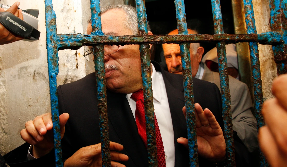 Tunisian Minister of Justice Noureddine Bhiri (C) visits the notorious prison of Ennadhour on April 29, 2012, in Bizerte. (AFP file photo)