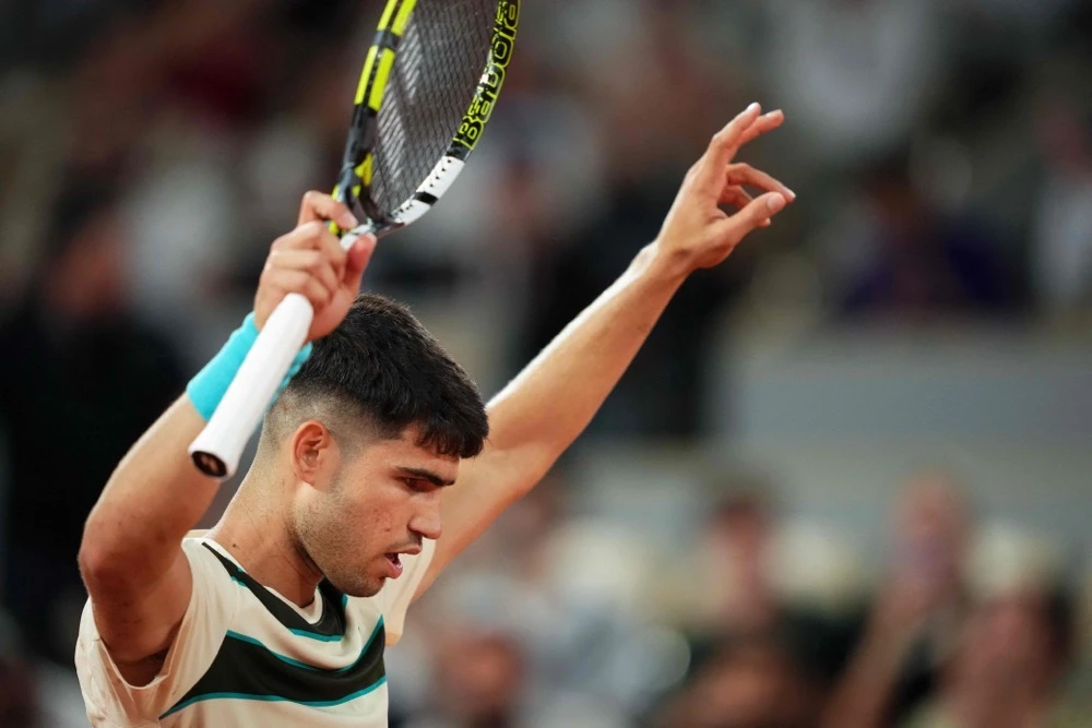 Carlos Alcaraz celebrates after winning. (AFP)