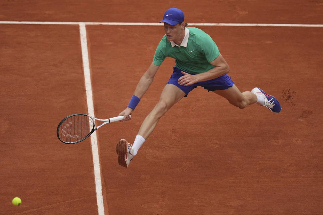 Italy’s Jannik Sinner reaches for the ball as he plays Jiri Lehecka of the Czech Republic during their third round match of the French Tennis Open, at the Roland-Garros stadium, in Paris, May 31, 2025. (AP)