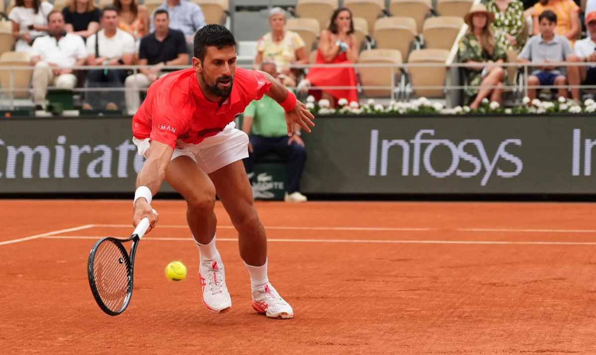 Serbia's Novak Djokovic returns the ball to Austria's Filip Misolic during their third round match of the French Tennis Open, at the Roland-Garros stadium, in Paris, Saturday, May 31, 2025. (AP)
