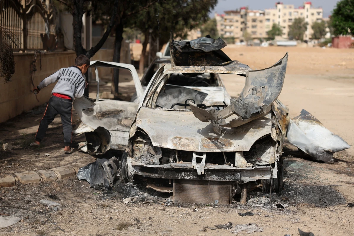 The Israeli assaults on Syria go beyond merely wearing Al-Sharaa down or blackmailing him (File/AFP)