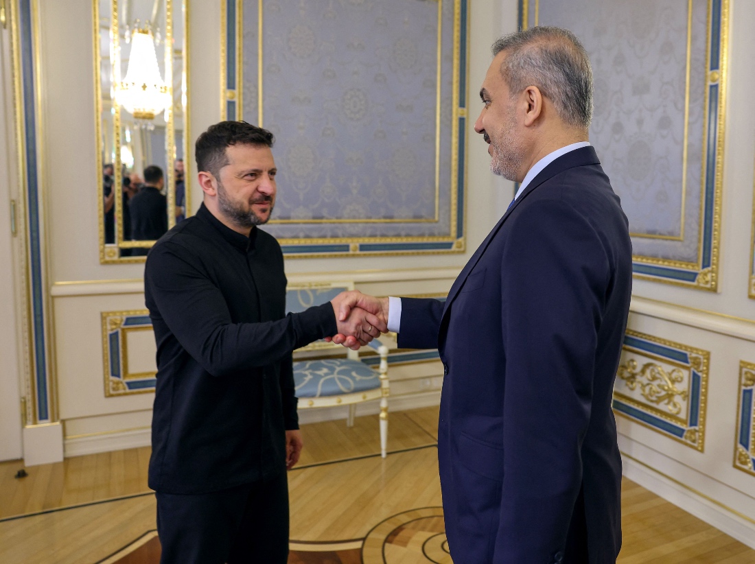 Ukrainian President Vladimir Zelensky shakes hands with Turkish Foreign Minister Hakan Fidan during a meeting in Kyiv, Ukraine. (Handout)