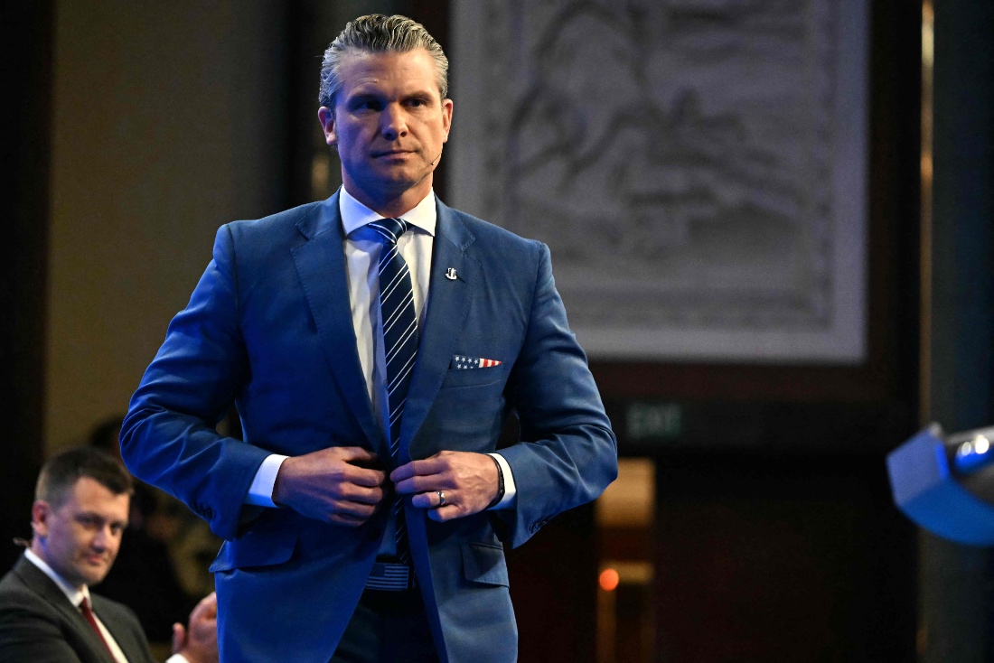 US Secretary of Defense Pete Hegseth walks on stage to deliver a speech at the Shangri-La Dialogue Summit in Singapore. (AFP)